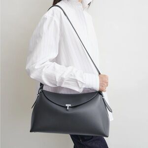 Toteme T-lock shark bag silver metal